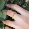 minimalist 14k gold wedding band